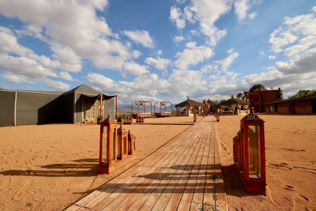 A luxury desert camp in Agafay, which can be visited during a surf trip to Morocco