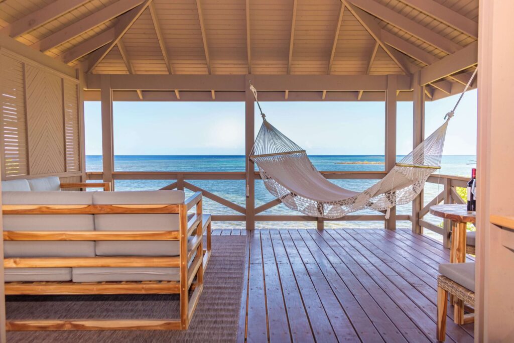 A hammock on an oceanfront balcony at Anthony's Key Resort in Roatan