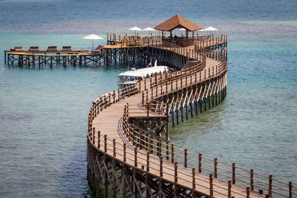 The snaking jetty at Ayana Komodo Waecicu Beach - an eco-conscious hotel in Labuan Bajo