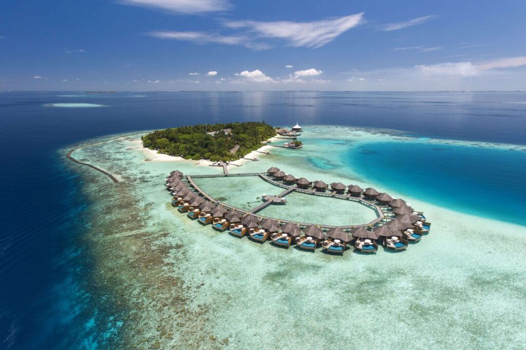An elevated view of the overwater bungalows at Baros Maldives