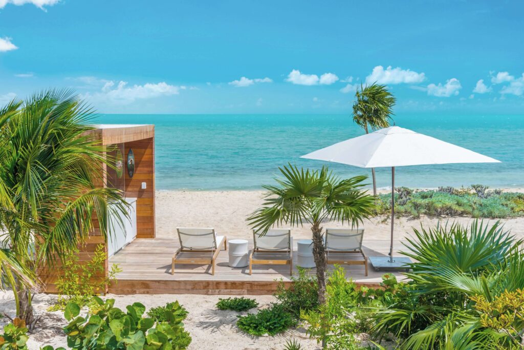 Sun loungers overlooking the Caribbean Sea at Beach Enclave