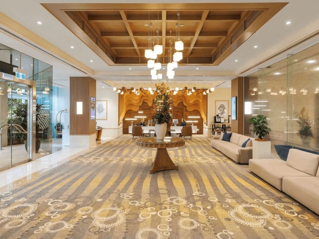 The lobby of the luxurious Pullman Reef Hotel in Cairns - one of the best places to stay for diving the Great Barrier Reef 