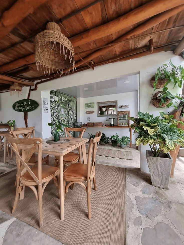 Best eco-friendly hotels in Barranquilla: The leafy dining space at the Kite Eco House in Salina del Rey