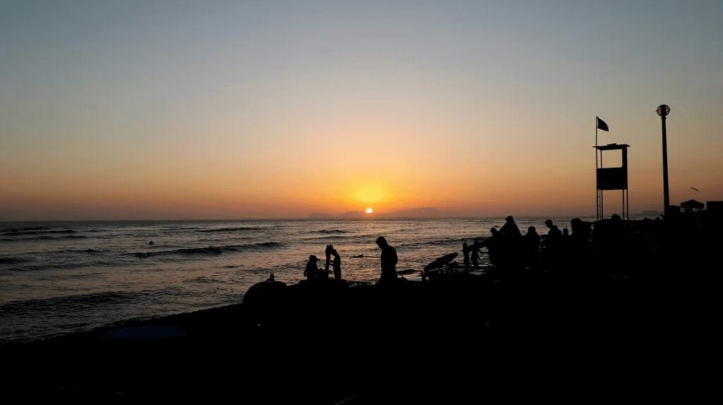Watching sunset at one of the best surf spots in Peru