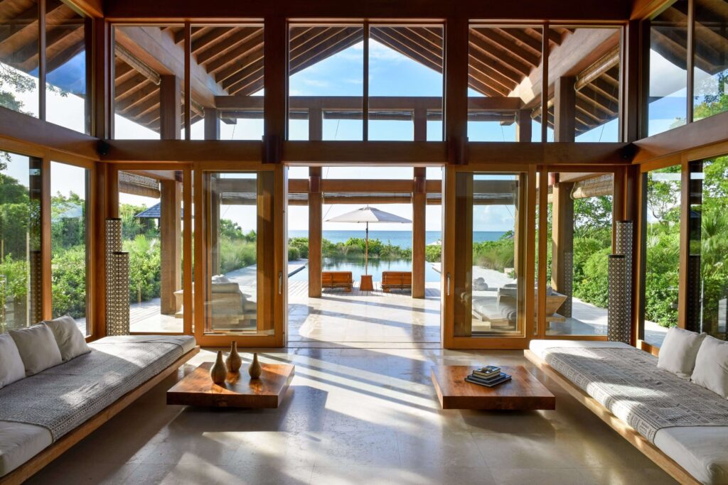 A lounge overlooking a private pool at COMO Parrot Cay