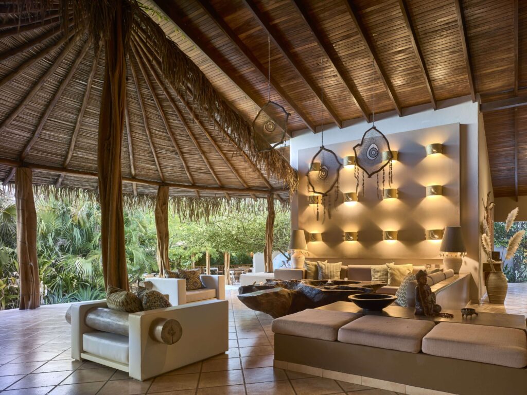 The open-sided lobby area of Cala Luna Boutique Hotel in Tamarindo