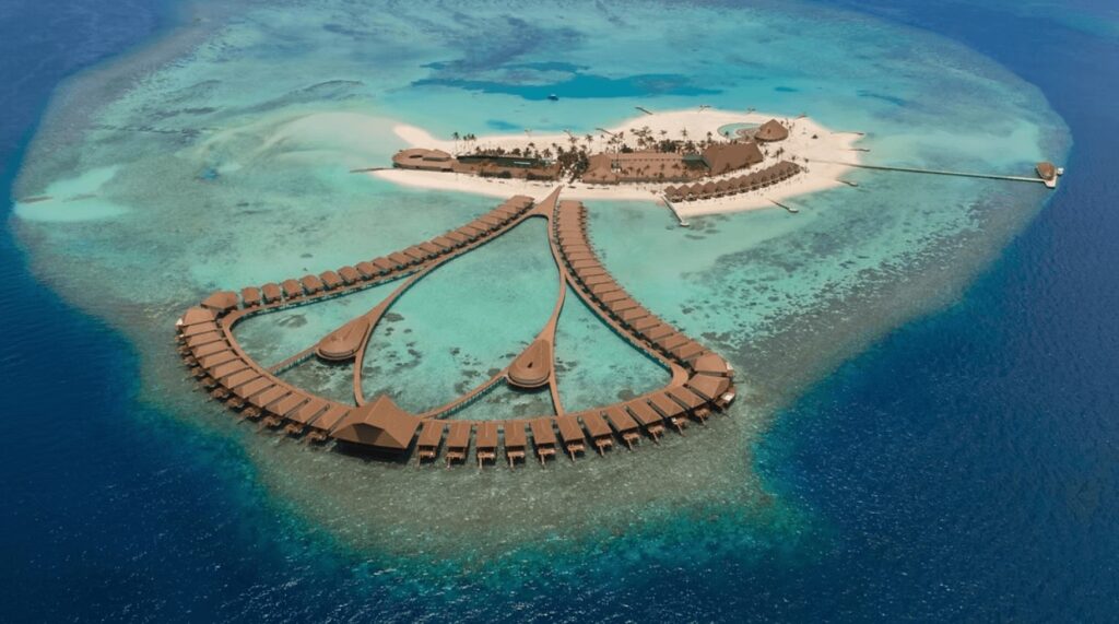 An aerial view of the overwater bungalows at Cinnamon Velifushi Maldives 