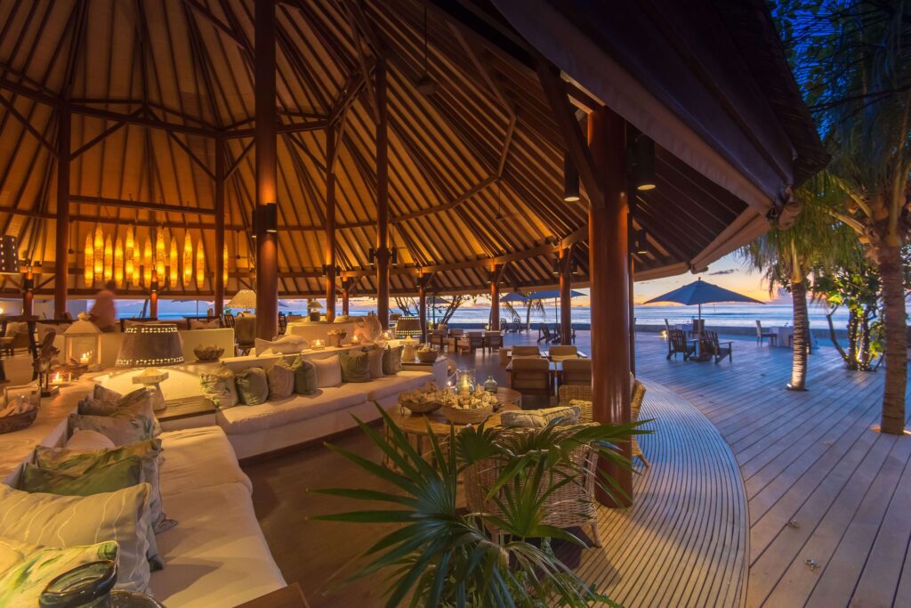 Lanterns illuminate an alfresco lounge at Denis Private Island in the Seychelles