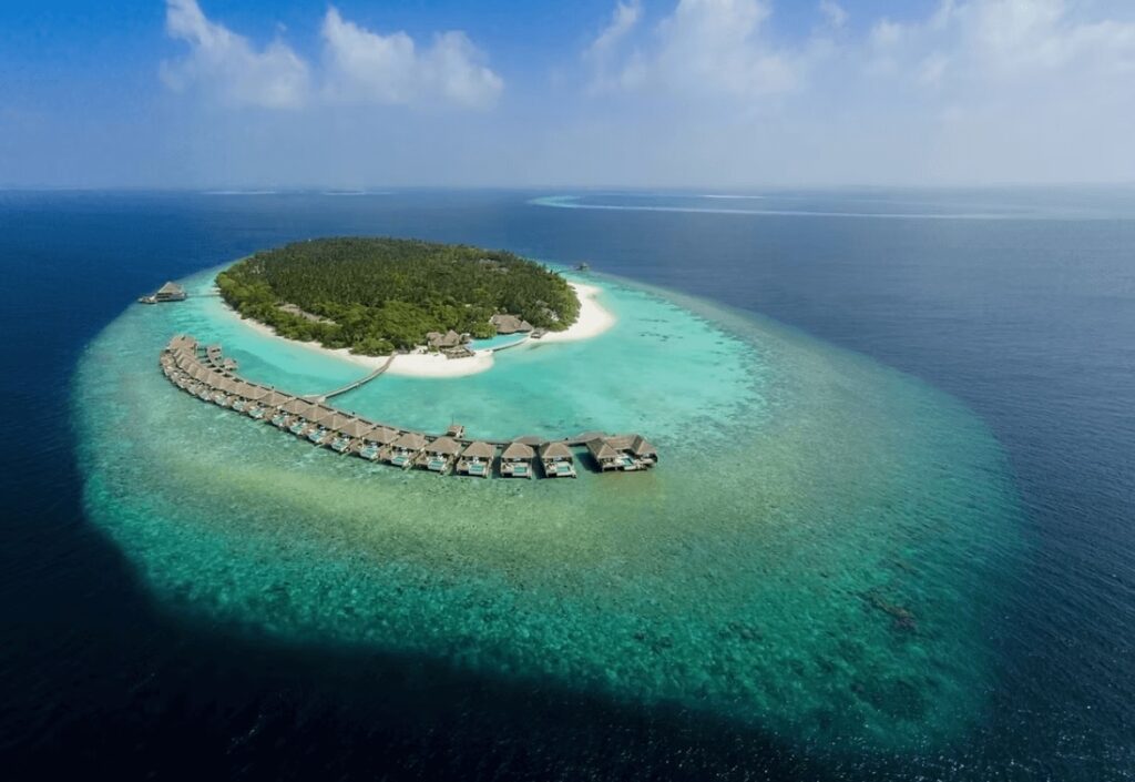 An aerial view of the overwater bungalows at Dusit Thani, an eco-friendly luxury resort in the Maldives