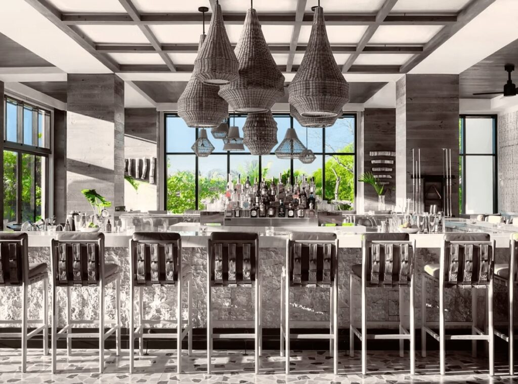 A breezy bar at Kimpton Grand Roatan Resort & Spa, a sustainably-run hotel on Roatan 
