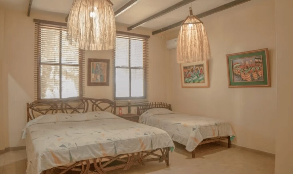 One of the light-filled rooms at the Hosteria Ecologica El Faro, an eco-friendly hotel in Salinas, Ecuador