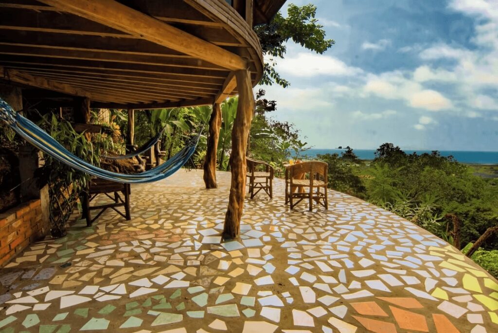 Hammocks on the stone terrace of Cabañas Cochapunko, one of the best eco-friendly hotels in Ecuador for surfers