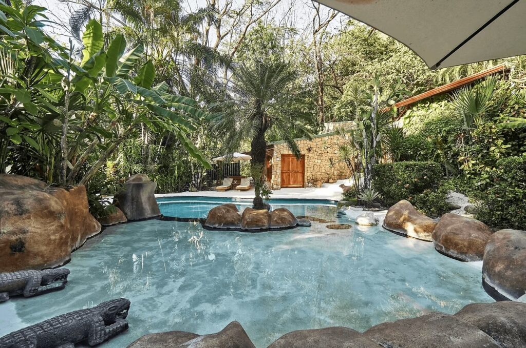 A lagoon-like swimming pool at the eco-friendly Havana Lodge in Santa Teresa