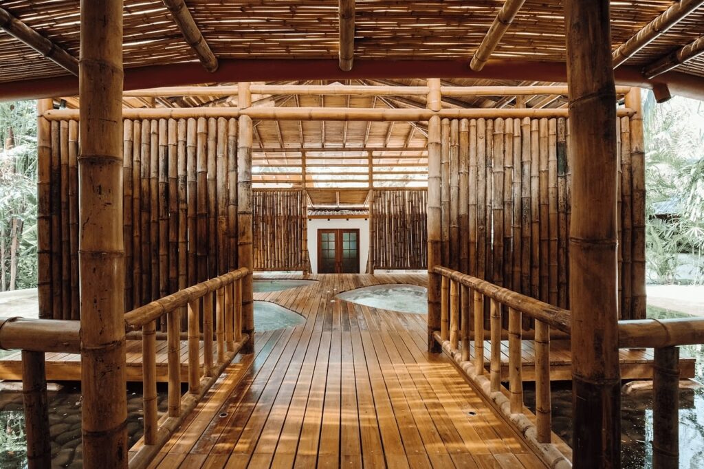 A boardwalk leads to the Bambu Spa at Florblanca Resort in Santa Teresa