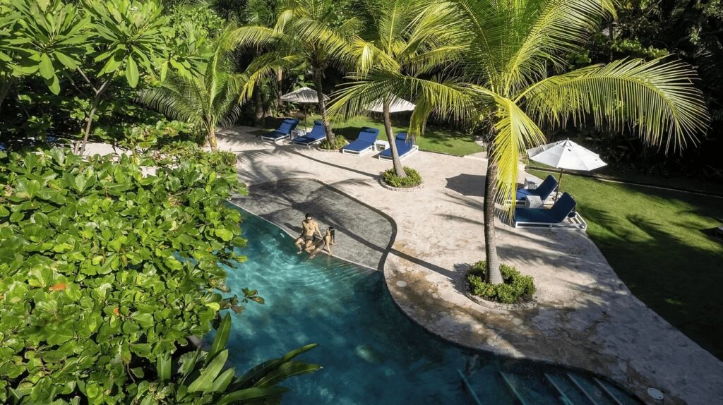 An aerial view of the swimming pool at Hotel Nantipa - an eco-friendly resort in Santa Teresa, Costa Rica