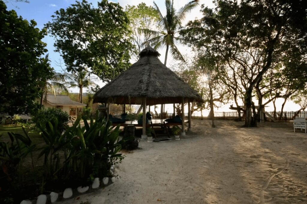 A thatched roof yoga shala at Scar Reef Resort, an eco-friendly place to stay in West Sumbawa