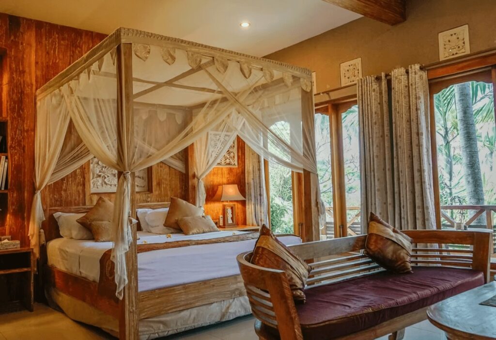 A Balinese-inspired suite at Puri Dajuma Beach Eco-Resort & Spa in Medewi 