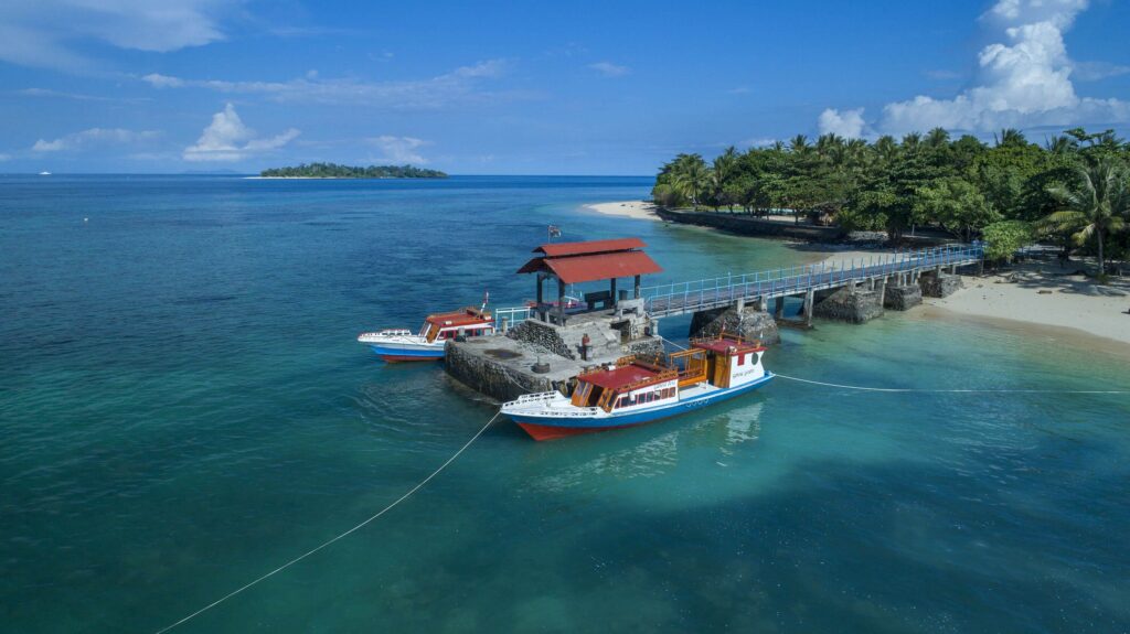 Elevated view of the dive boats and jetty at Gangga Island Resort & Spa