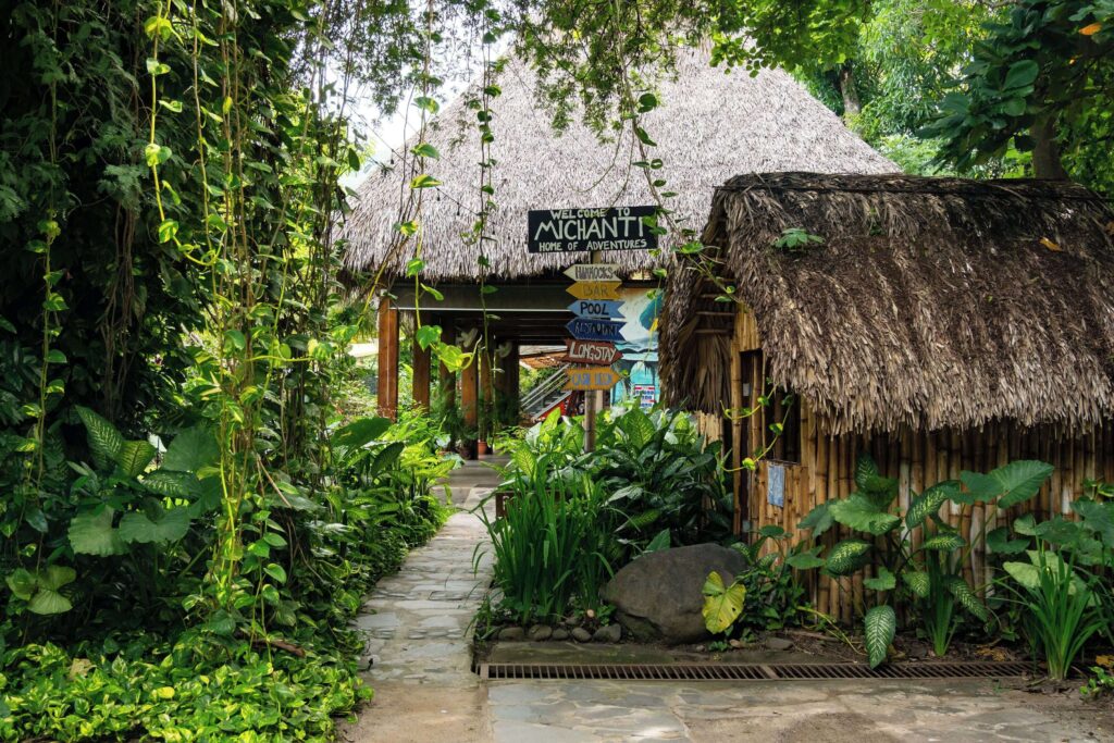 Greenery frames a path in the grounds of Hotel Michanti