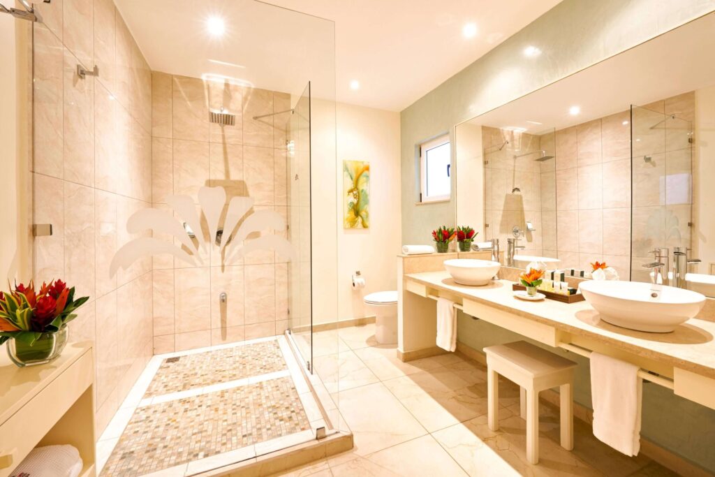 A modern ensuite bathroom at Jardin del Eden Boutique Hotel in Tamarindo