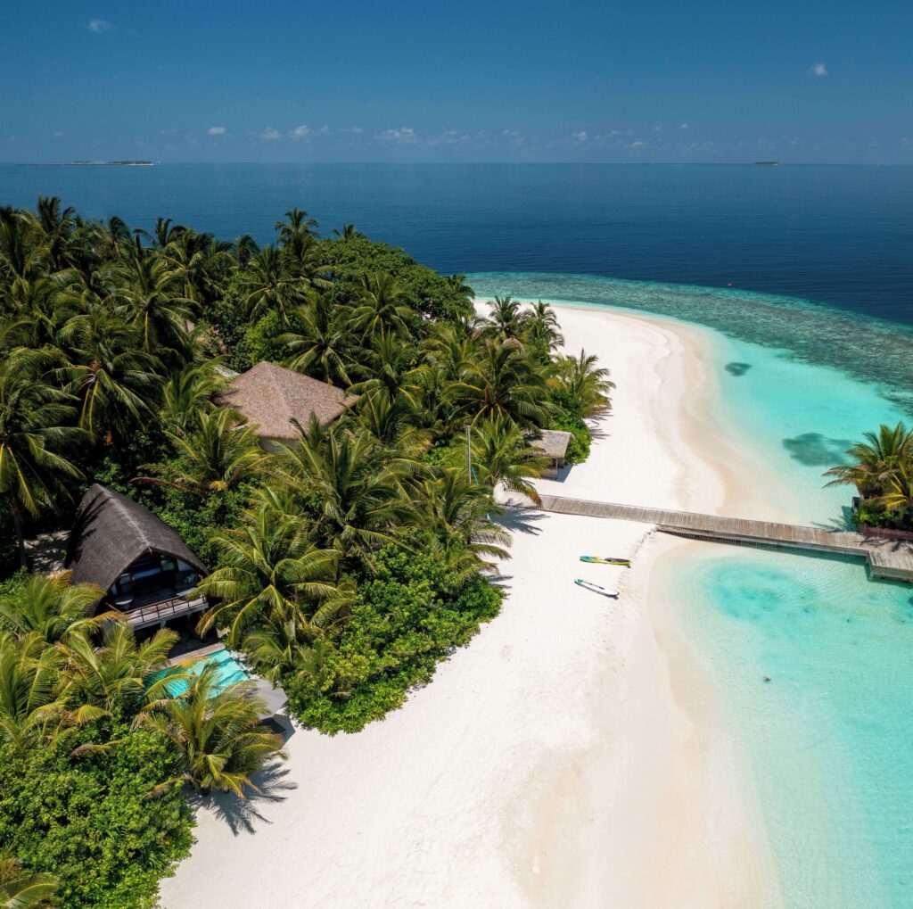 An elevated view of the private island setting at Kandolhu Maldives