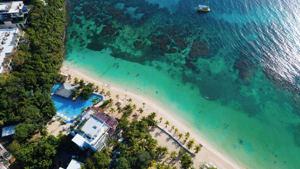 A bird's eye view of the beachfront setting at Kimpton Grand Roatan Resort & Spa