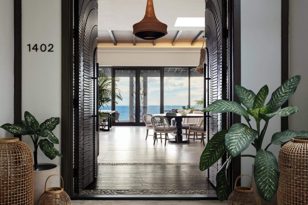 Looking into a waterside dining space at Kimpton Grand Roatan Resort & Spa