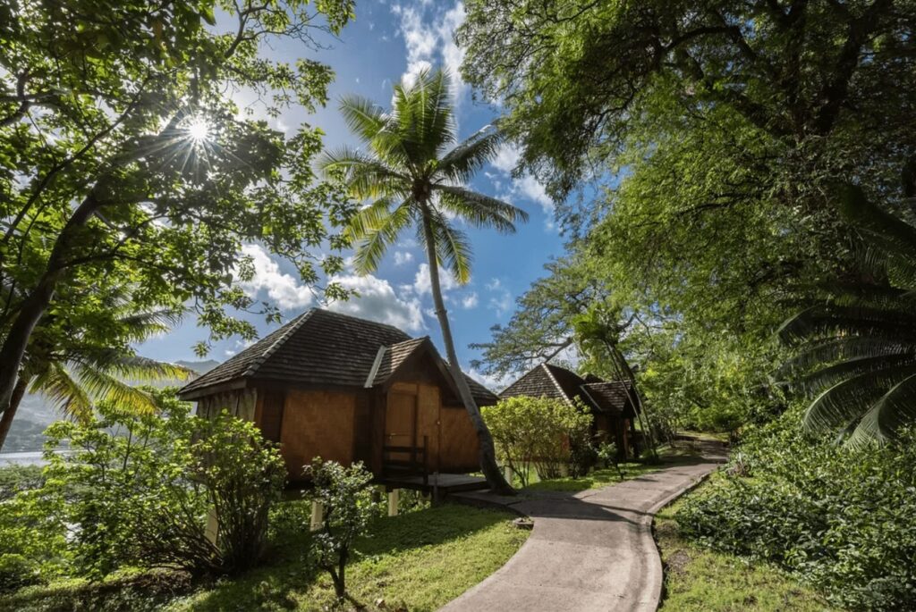A path leads between the eco-friendly bungalows of Le Nuku Hiva in the Marquesas Islands 