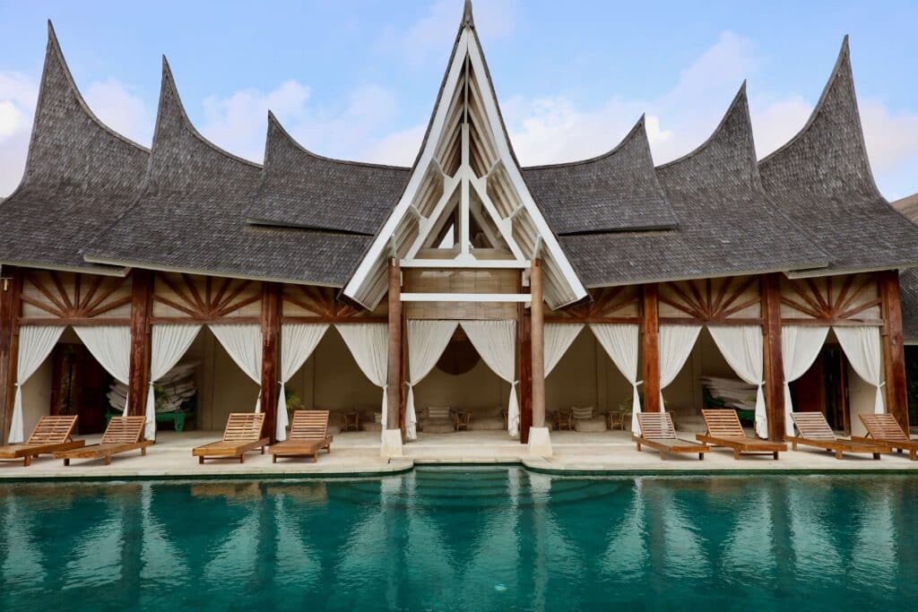 A Javanese-inspired building overlooking a pool at Rascals in Kuta, Lombok