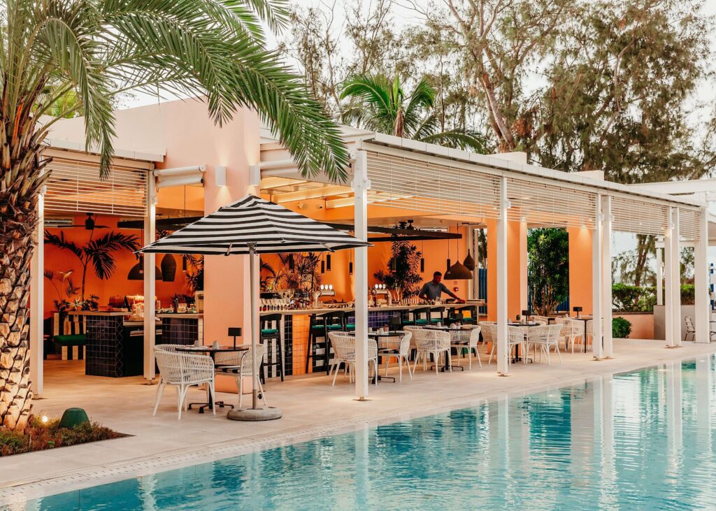 A poolside bar at Salt of Palmar - a sustainable hotel in Mauritius