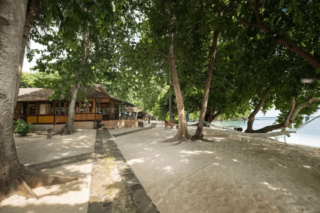 The beachfront setting of an eco-friendly dive resort in Sulawesi 