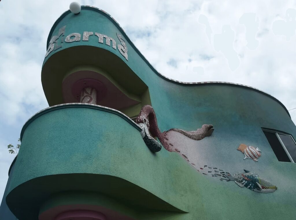 Wildlife mosaics on the exterior of Eco Hotel Katarma, a sustainable hotel in Galapagos Islands