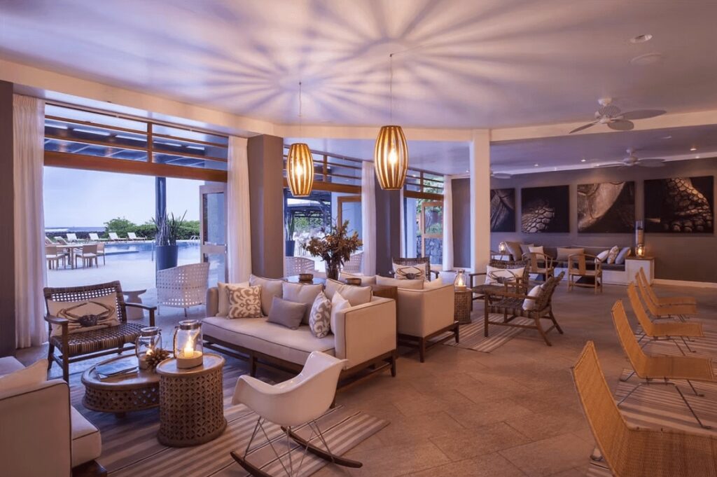 A sophisticated lounge at Finch Bay Galapagos Hotel, one of the best eco-resorts in the Galapagos Islands
