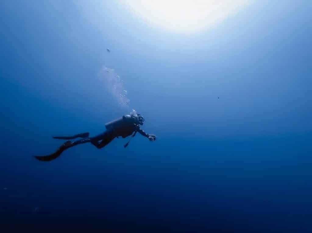 A scuba diver exploring the deep blue
