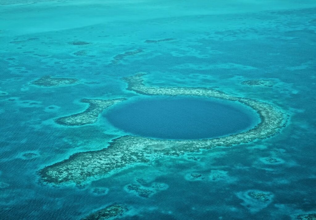 Marine conservation organisations to follow: A blue hole seen from the air