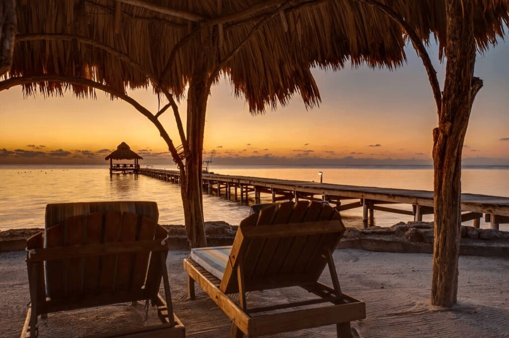 Sunset from the dock of Xanadu Island Resort, one of the best dive resorts in Belize