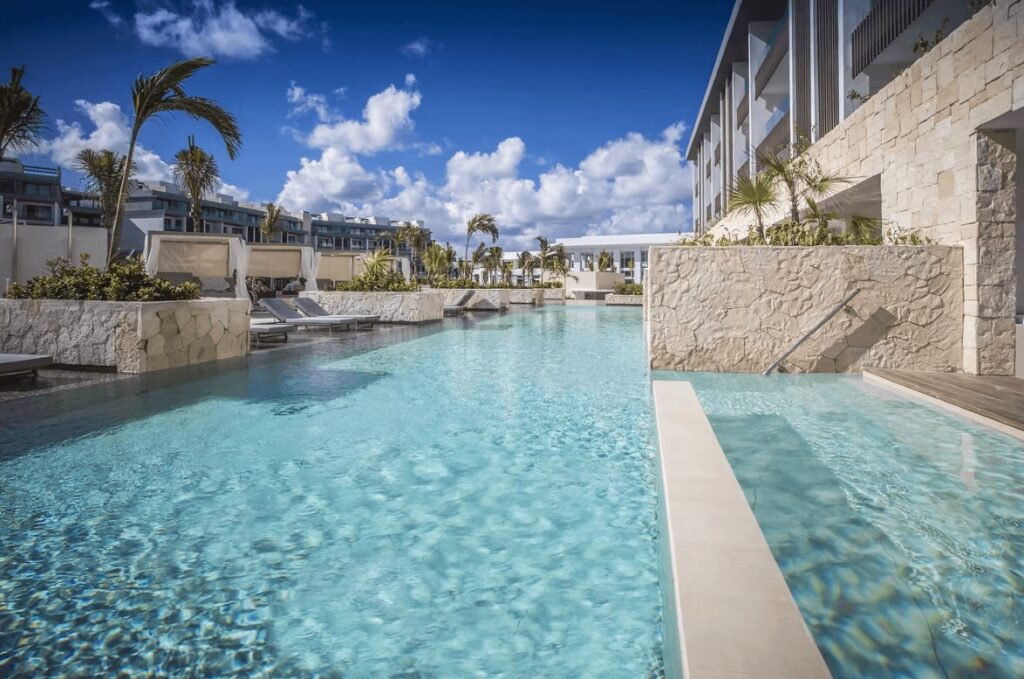 One of the many swimming pools at the Majestic Elegance Costa Mujeres, an eco-friendly resort in Mexico