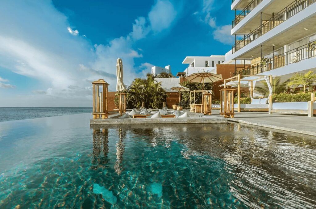 An oceanfront infinity pool at Hotel B Unique - an eco-friendly hotel in Cozumel 