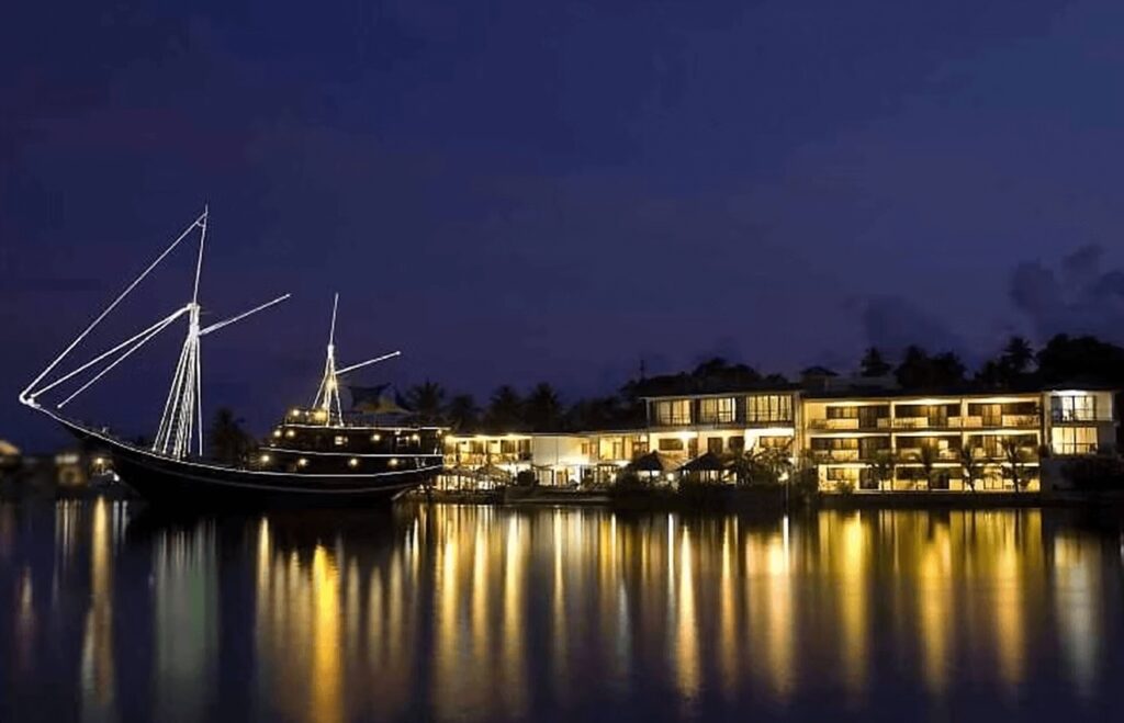 A floating restaurant illuminated alongside the Manta Ray Bay Resort in Yap 