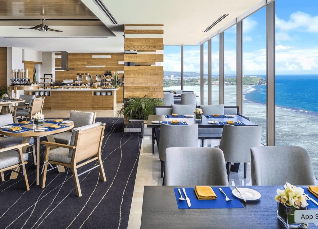 Dining overlooking the reef at the Dusit Thani Guam Resort, an eco-friendly hotel in Guam 