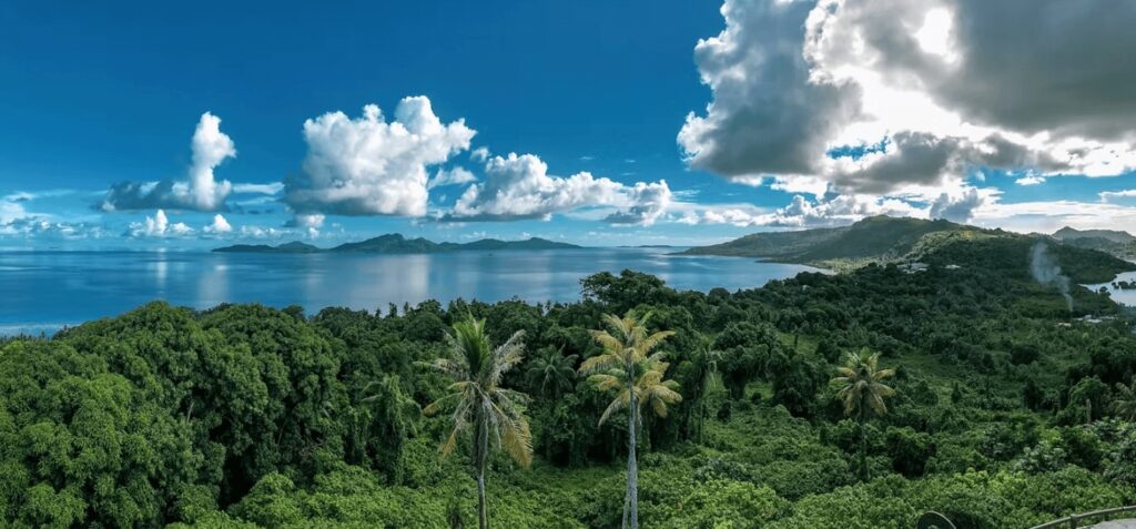 An idyllic island scene in Micronesia - one of the best places for diving in the Pacific