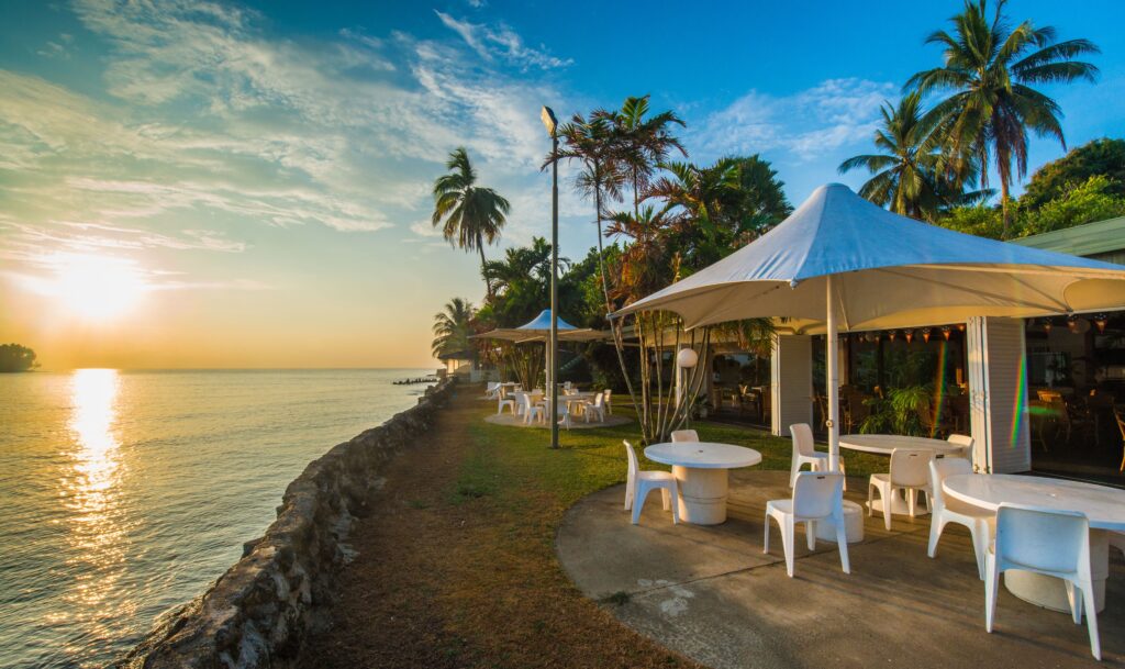 The waterfront setting of Madang Resort, one of the best places to stay in Papua New Guinea for divers