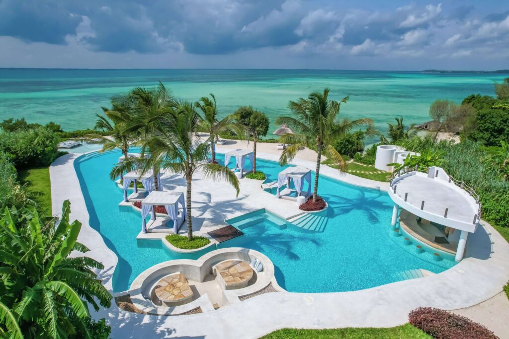 The oceanfront swimming pool at Ycona Eco-Luxury Resort, one of the best eco-friendly resorts in Zanzibar 