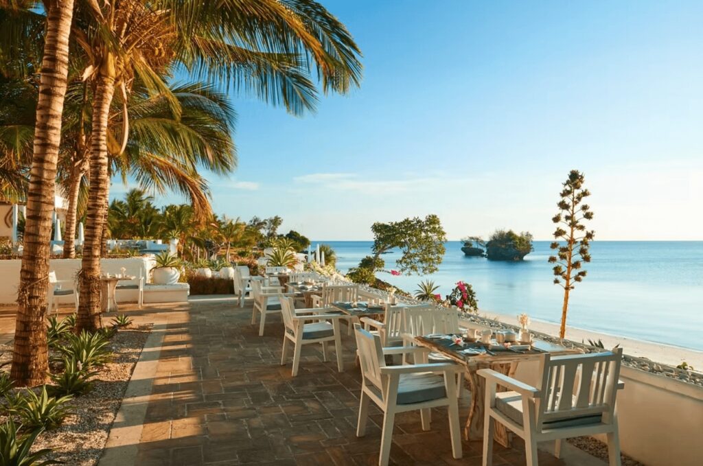 Waterfront dining at The Aiyana Resort & Spa, an eco-friendly hotel on Pemba Island 
