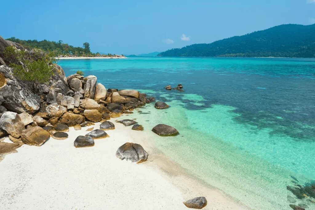 Best places to dive in Thailand: An idyllic cove flanked by boulders in the Andaman Sea