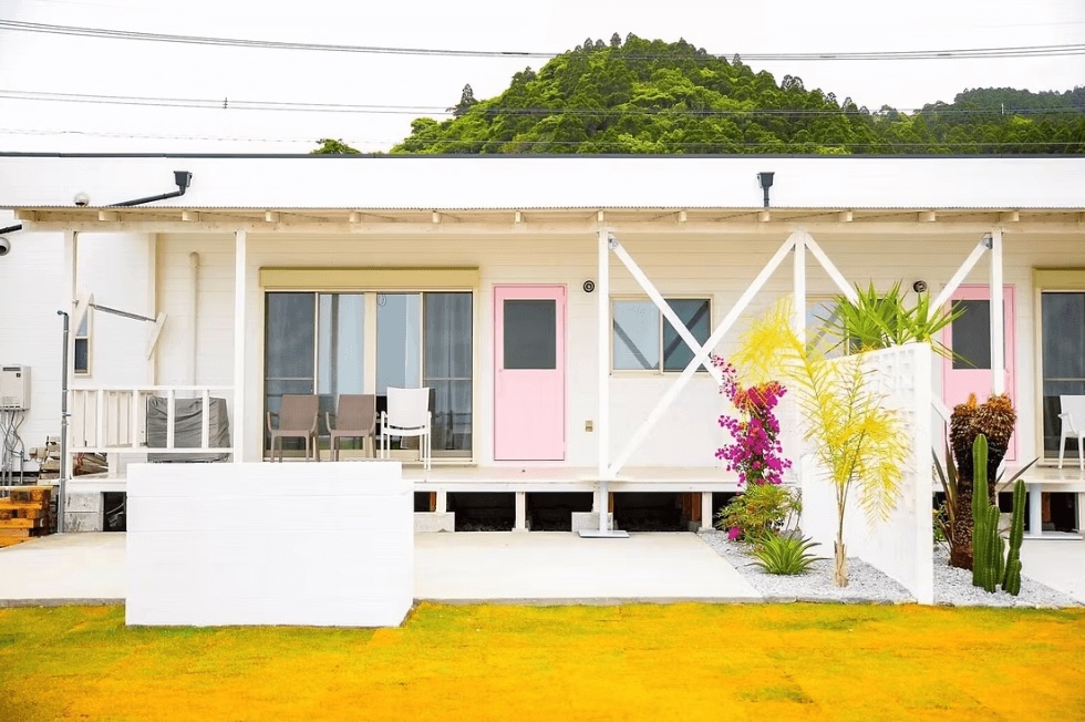 Best places to surf in Japan: One of the whitewashed beachfront villas at Shirahama Beach Garden in Aoshima, Japan