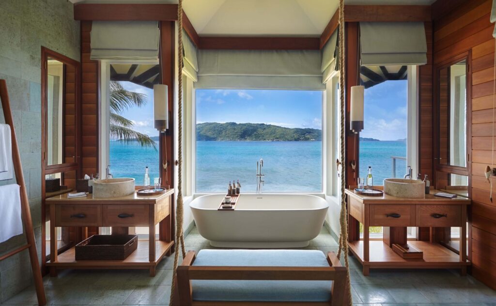 A bathtub with ocean views at Six Senses Zil Pasyon - a sustainably managed resort in the Seychelles