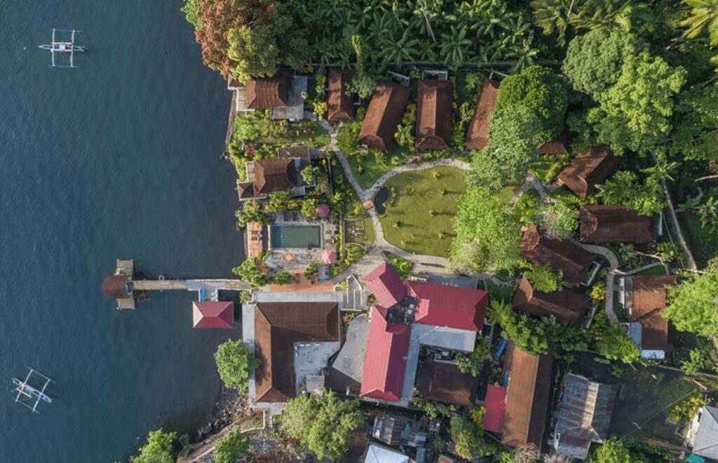 Eco-friendly dive resorts in Lembeh Strait: An aerial view of Solitude Lembeh Resort - a Green Fins dive resort in Lembeh Strait 