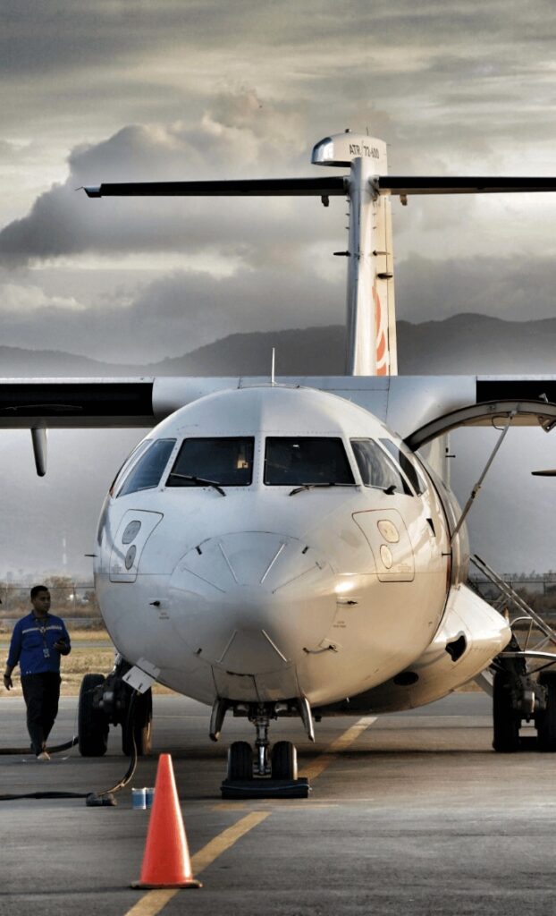 A plane touches down on Sumbawa Island - one of the best places to surf in Indonesia