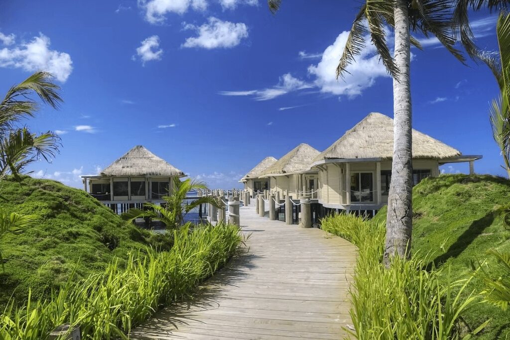 Surfing in Samoa: Overwater bungalows at an eco-friendly resort on Upolu